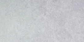 基壇部大判タイルの写真＃基壇部大判タイル＃エントランス低層部には、大理石の繊細さと石灰石の質感を融合した大判タイルを採用。上品で洗練された空間を目指しました。