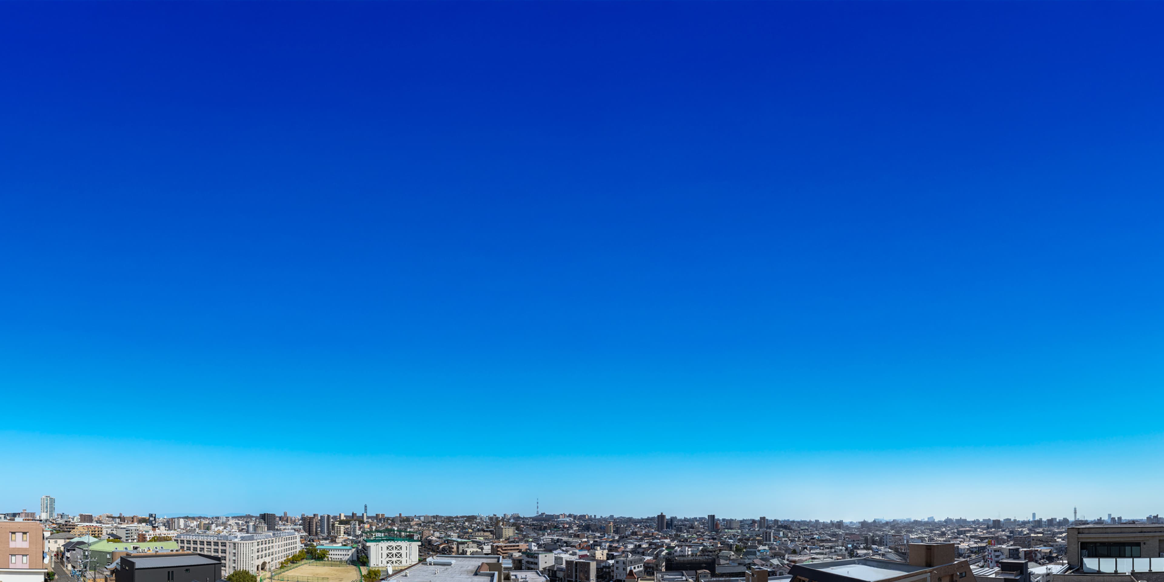 現地より5階相当の高さから南東方向を望む眺望写真(2025年3月撮影)