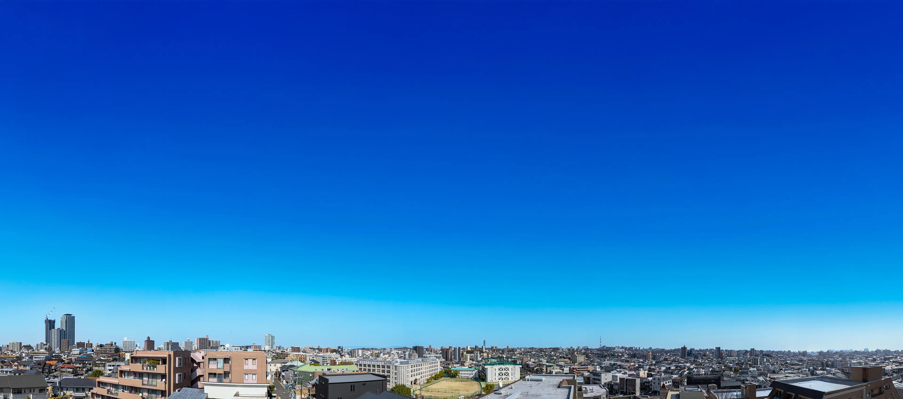 現地より5階相当の高さから南東方面を望む眺望写真（2025年3月撮影）